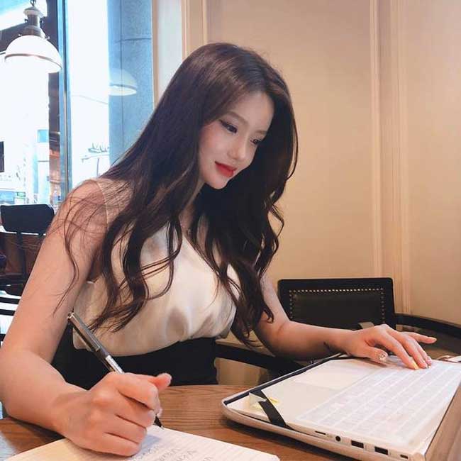 Extremely poised while grading students' papers