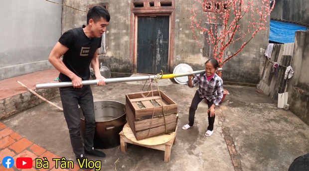 Mrs. Tan and her son struggled to carry the result