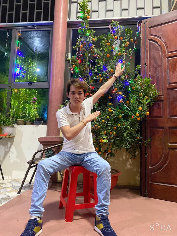 Nam Blue excitedly shows off his huge kumquat tree