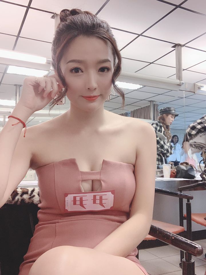 She has a beautiful face and a sexy figure
