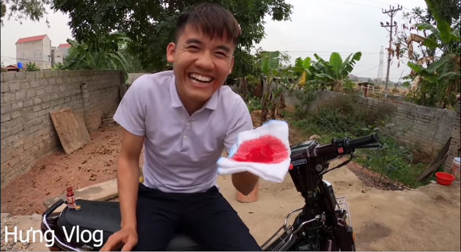 Hung Vlog pretends to be ill with a prop—a cloth soaked in red dye—to test his mother's reaction.