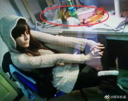 Her messy room with lots of food on the table