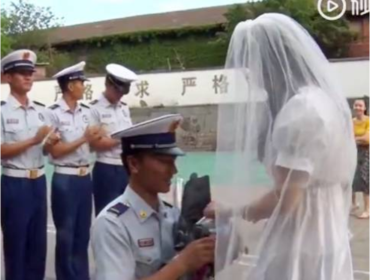 He gently knelt down to give her the ring.