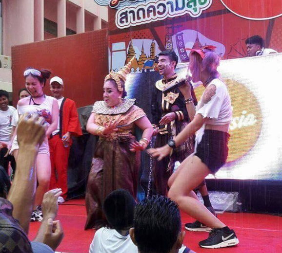 Images of her performing comedic antics at a fair.