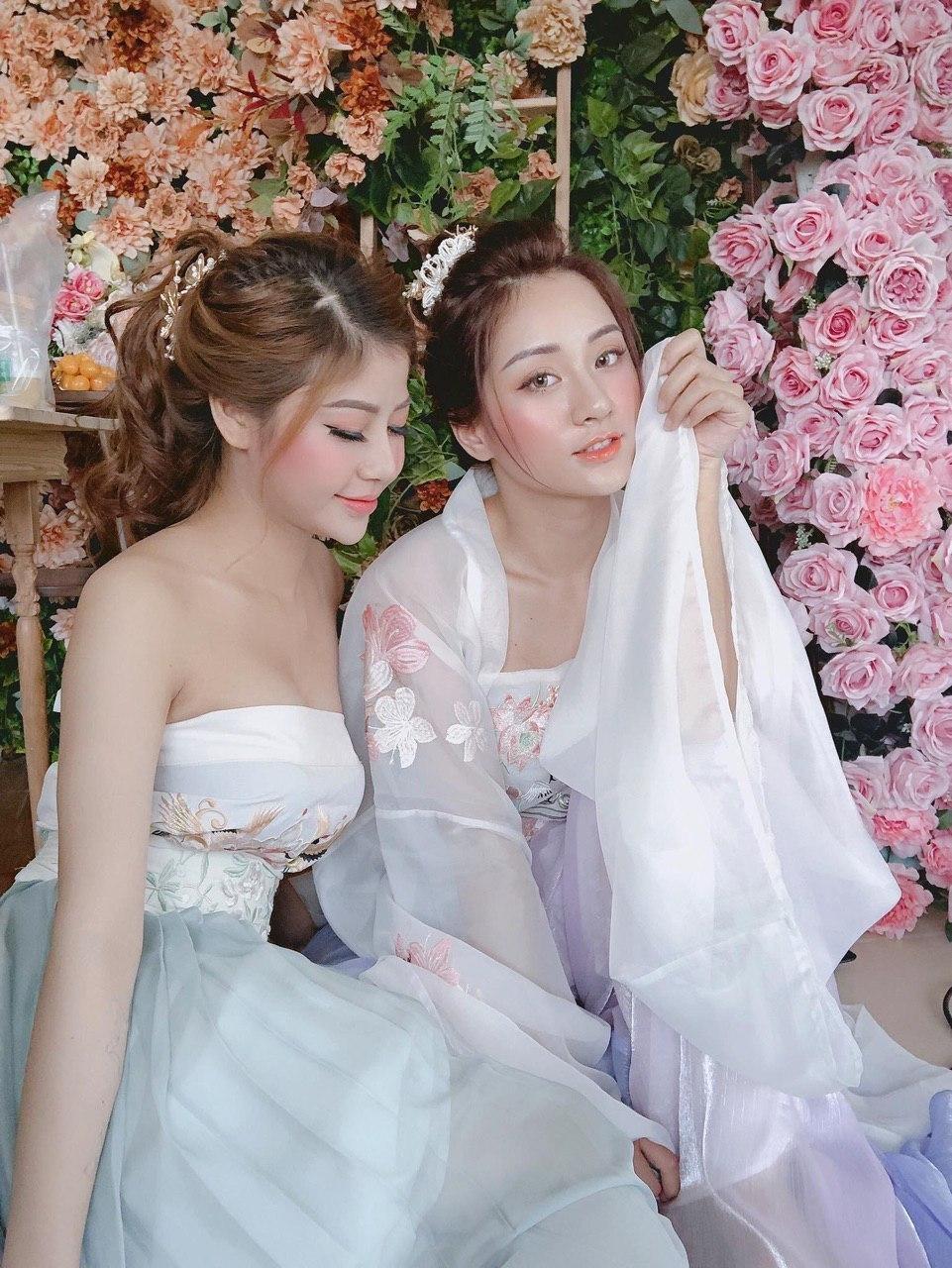 Playing games while admiring two stunning beauties...