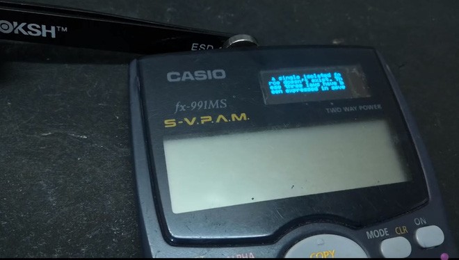 This YouTuber used a magnet attached to the end of a pen, along with some magnetic sensors to activate the OLED screen on his Casio calculator.