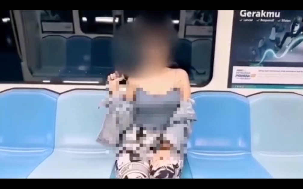 Then she unexpectedly took off her top