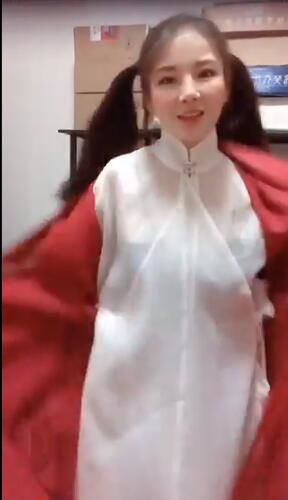 Then step by step she removed her clothing layers