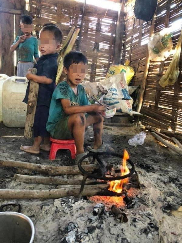 Images of four children living in a simple bamboo house with sparse furniture.