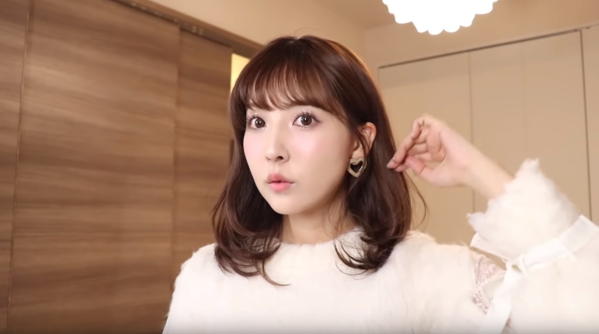 And this is the moment after she has completed all her makeup tasks