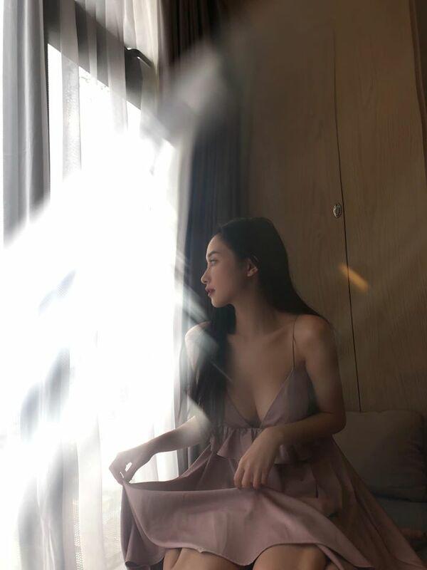 She wore a dress with a deep neckline that drew all attention to her ample bust.