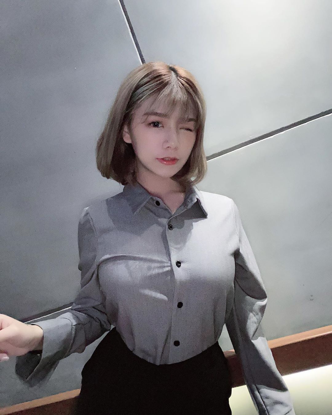 Even when dressed modestly, she still has an undeniable charm