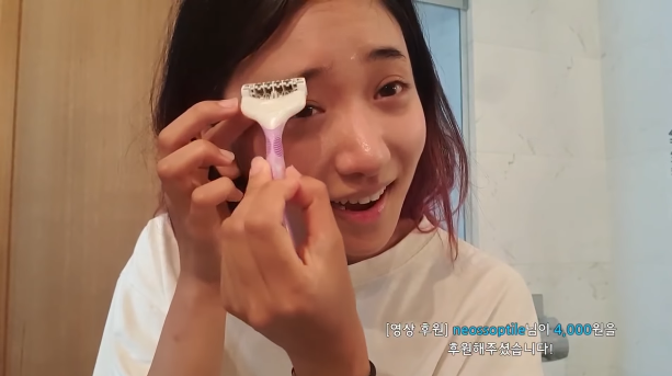 The streamer painfully recorded the challenge of shaving her eyebrows
