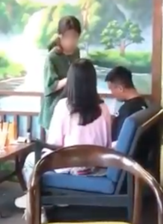 The girl in pink claims she's just the young man's ex - Clip still image