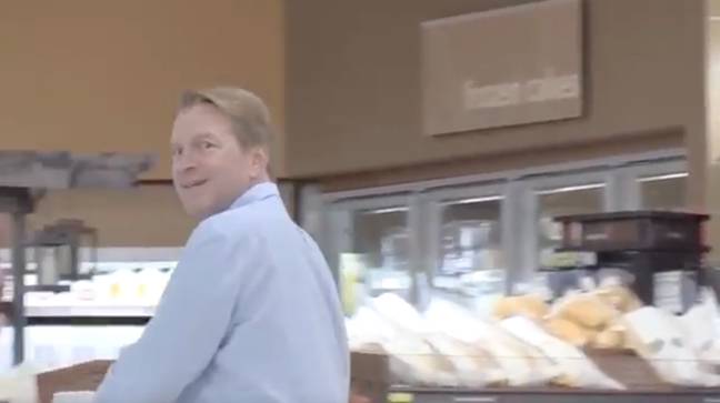 The shocked reaction of another shopper who can't believe his eyes