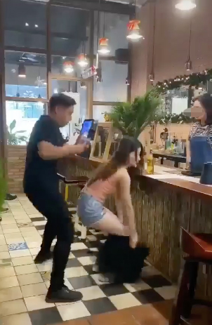 The girl unexpectedly pulls down her skirt after recalling where her money was