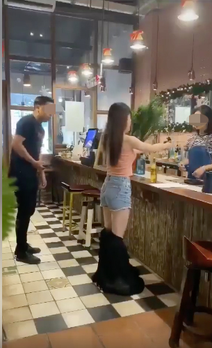 Calmly paying without a care in the world