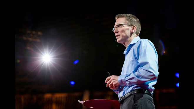 Jason Padgett presenting at a TED talk.