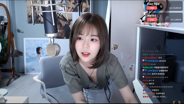 Moment of wardrobe malfunction with the low-cut top