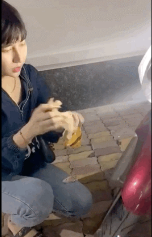 TikToker uses a tissue to clean his bike after spraying it with perfume.