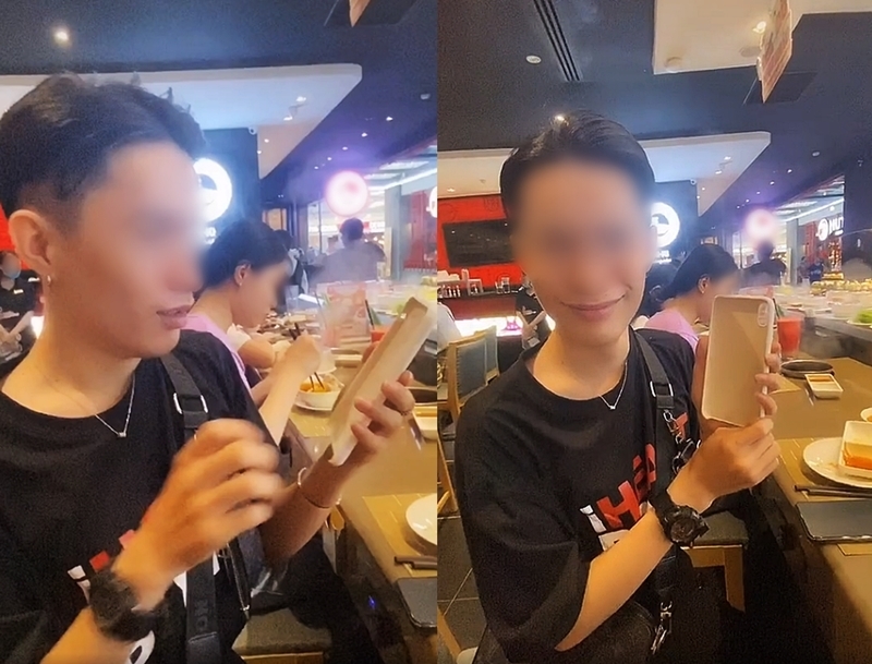 Image of the guy holding the phone case