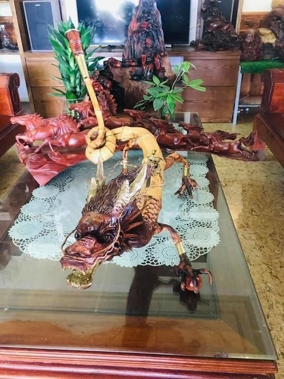 The pipe is intricately carved and sculpted