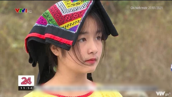 Image of the beautiful girl appearing on television.