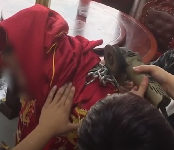 A chainsaw had to be called in to rescue the unwilling groom