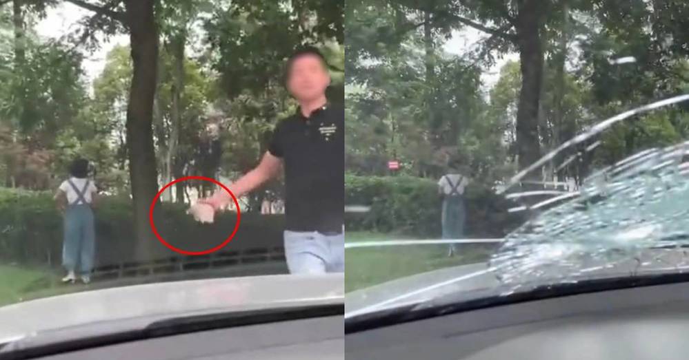 The unexpected act of grabbing a brick by the young man right after