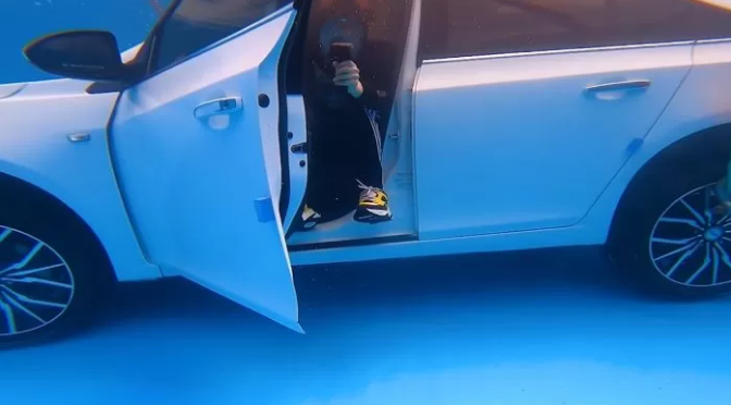 When the water filled the car 100%, he opened it very easily
