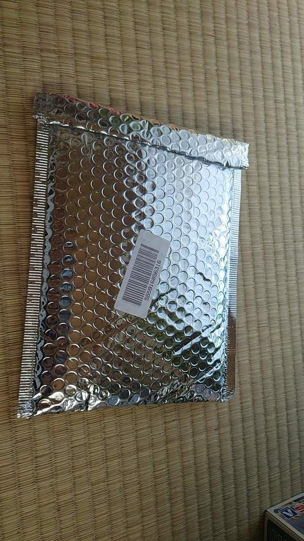 The package when it was delivered; looking this thin, the poor guy has enough reason to doubt already