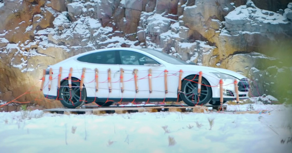 Image of the Tesla Model S wrapped in explosives