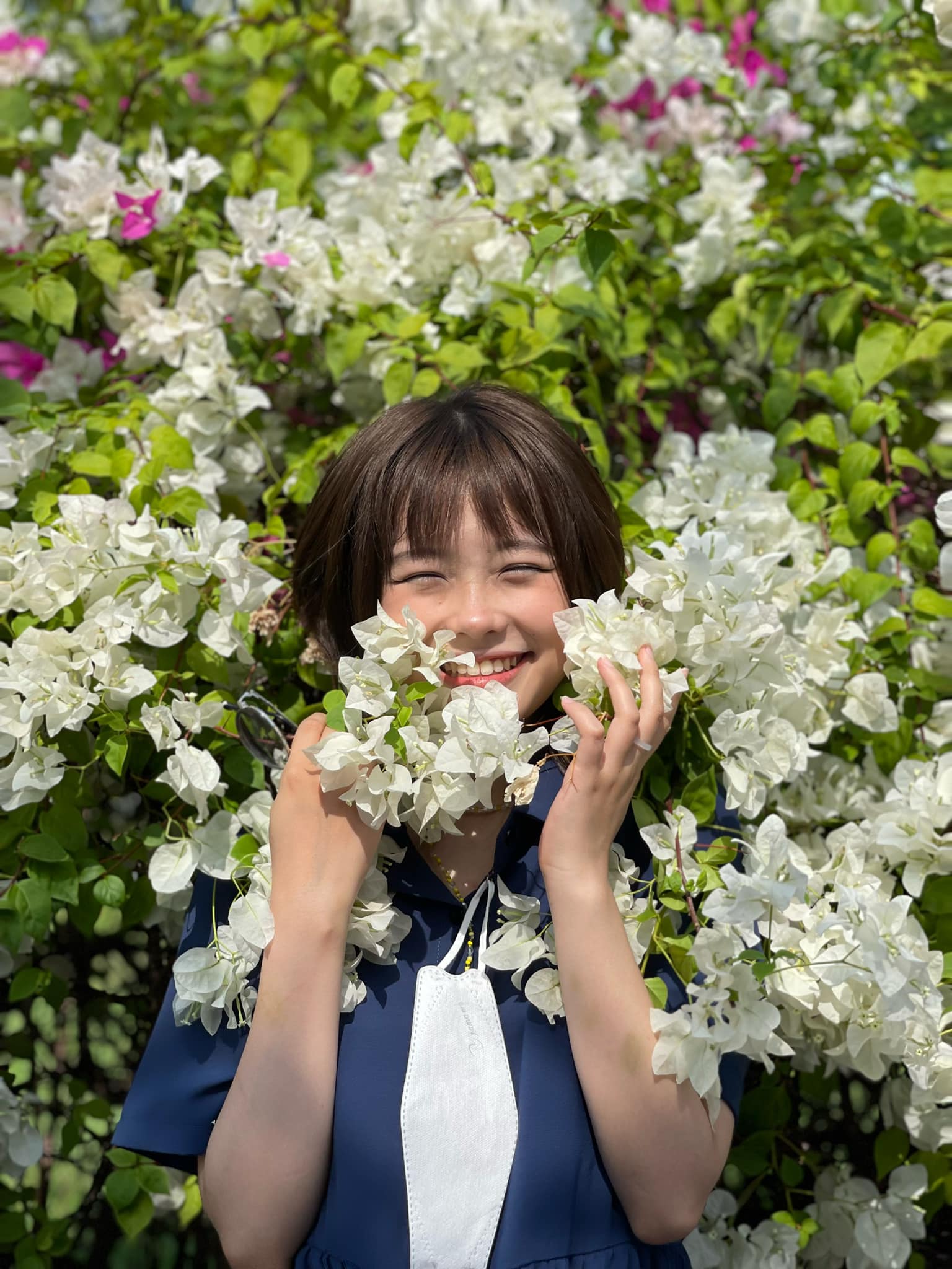 She has a radiant smile.