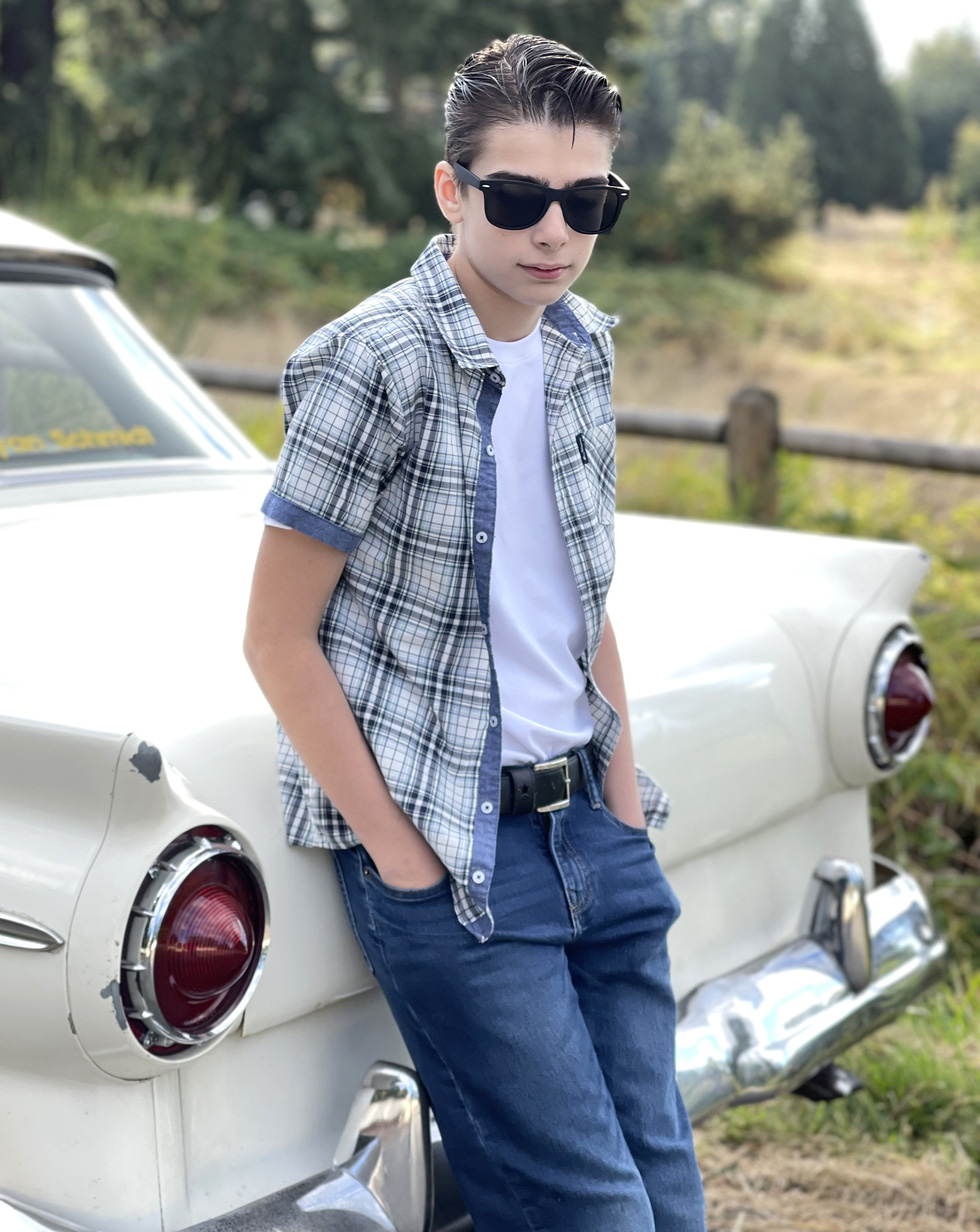 Anthony next to the car given by a fan. When he asked why they gave it to him, the person replied: 'I don't know. I just felt you should own this car' - Photo: anthonyryanschmidt.com