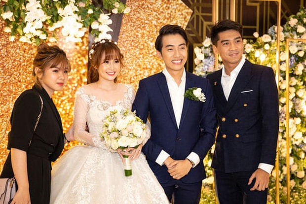 The couple attending Cris Phan's wedding in June 2019