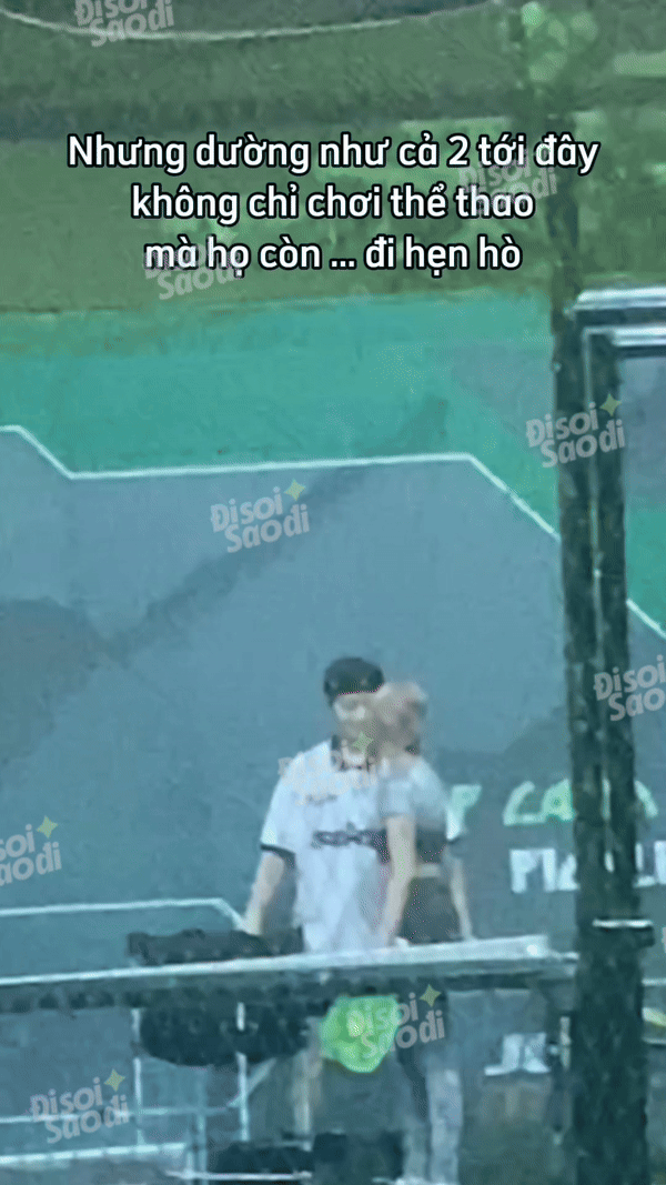 A moment of the couple passionately kissing on the court, oblivious to the people around them