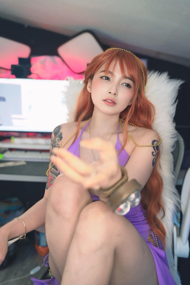 Stunning Hot Girl Showcases Nami Cosplay, Flawless and Alluring 3 47666918711995770081990117052683661323671923n 17396050277621412437052