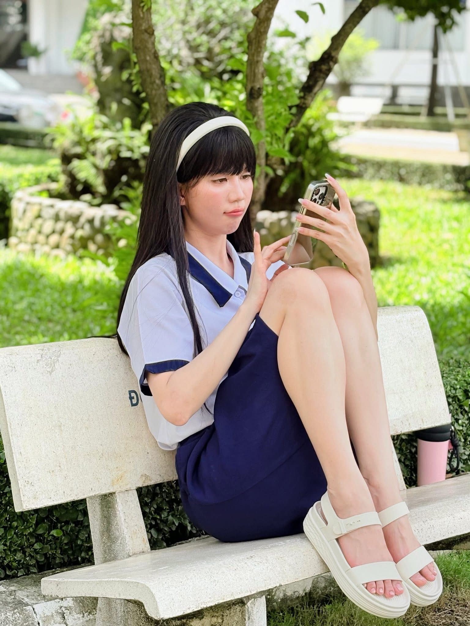 Ngọc Trinh Stuns Viewers with New Photo Shoot, Fans Do a Double Take 2 Ngọc Trinh looks youthful in her school uniform.